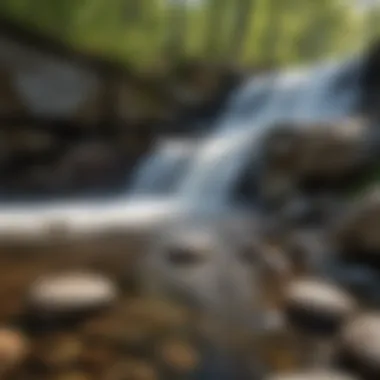 Close-up of water splashing against smooth stones.