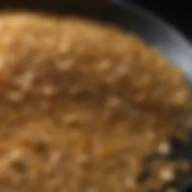 A close-up of gold flakes found in a pan