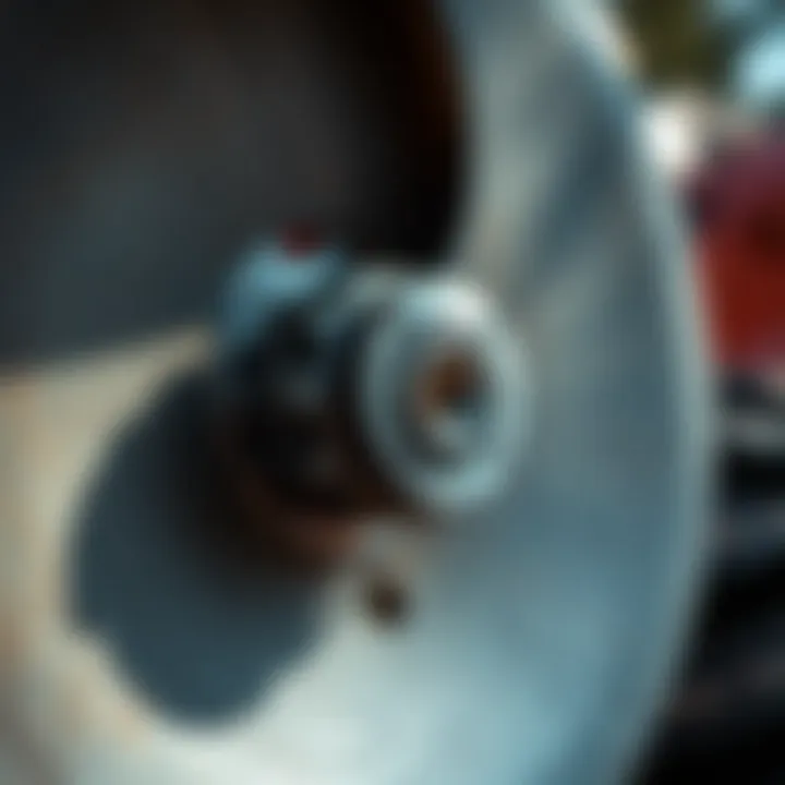 Close-up of the blade mechanism on an ATV box blade grader